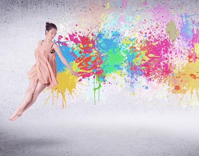 ballerina and spray of different paint colors